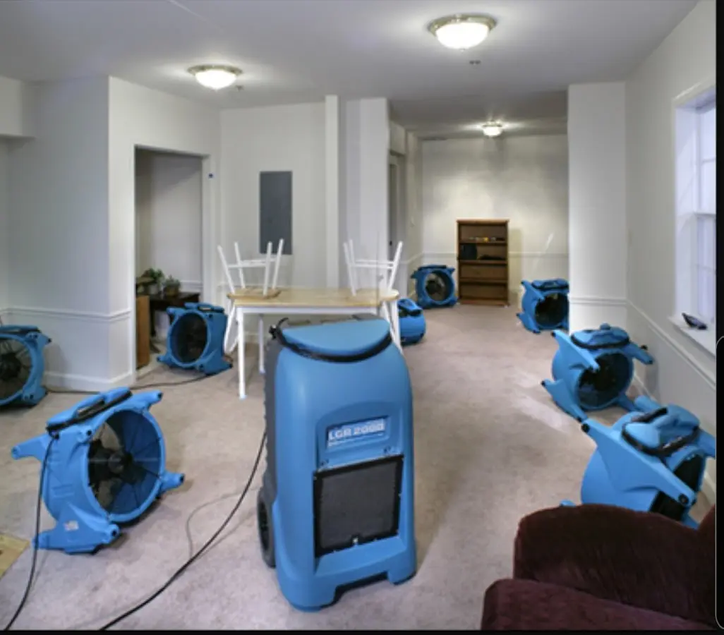 Air movers and dehumidifier setup for Water Damage Restoration in Mehlville